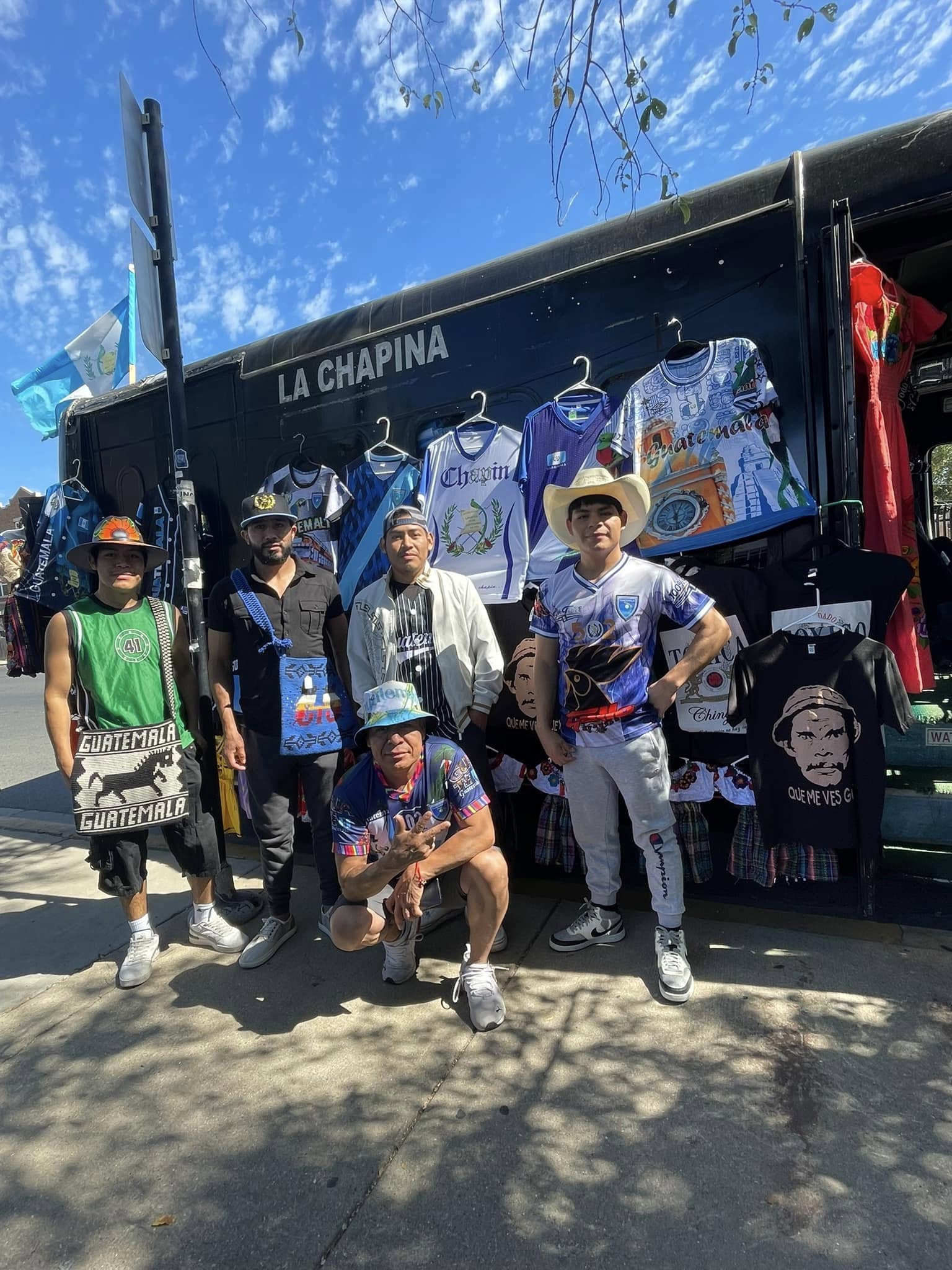 La Chapina team with mobile truck displaying Guatemala jerseys during community outreach event